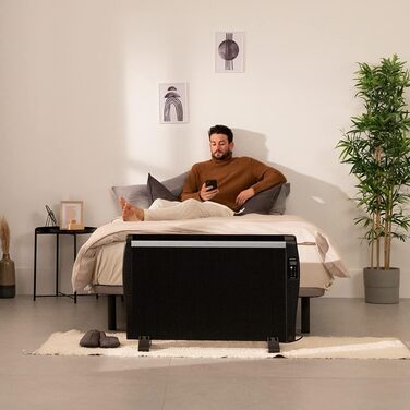 Cecotec ReadyWarm 2500 Thermal Black Flat Radiator with Remote Control. 12 heating ribs and 1800W, LCD display, programmable timer, temperature selection, 25 m² range, and maximum safety with 12 black elements.