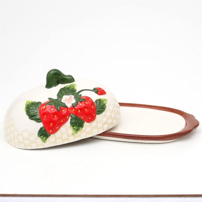 Dolomite Butter dish/Butter bell with strawberry relief. Size approximately 19.5 x 12.5 x 9.4 cm, 9