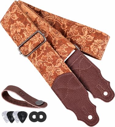 Гітарний ремінь з натуральної шкіри (2 дюйми) для акустичної, бас та електрогітари. Регулюється від 96 до 163 см. М'яка обробка деревини, коричнева квітка.