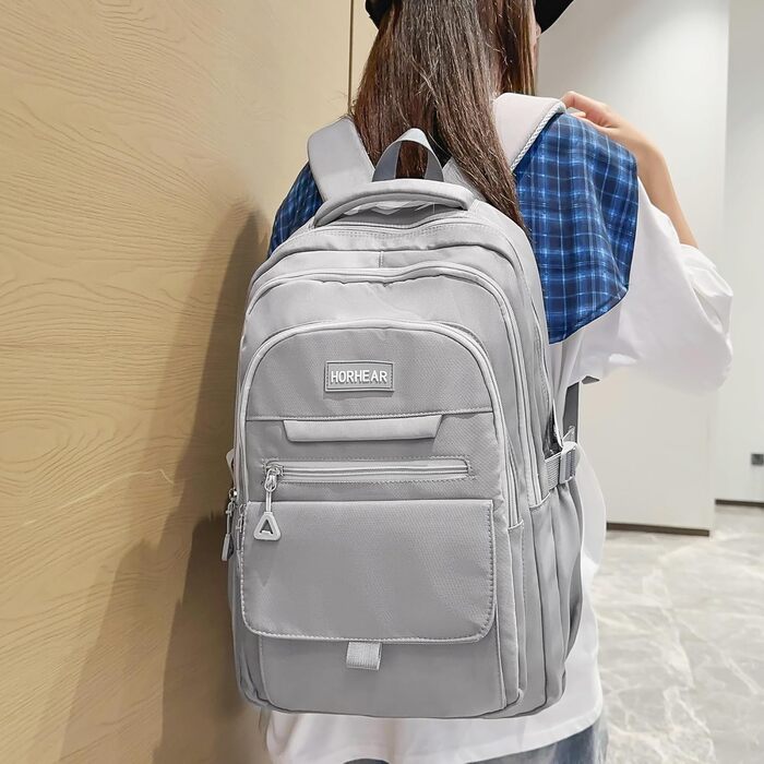 Шкільний рюкзак для дівчаток сірого кольору: стильний, місткий, для навчання та повсякденного використання