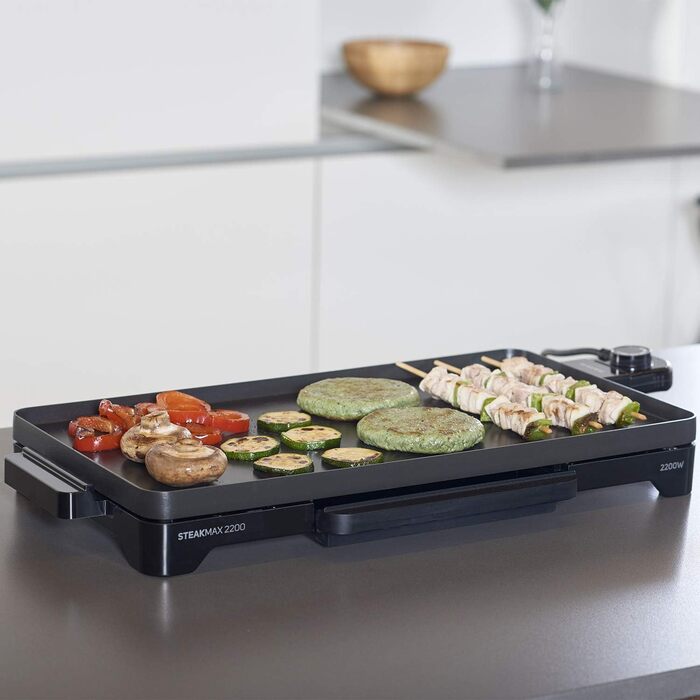Тaurus Steakmax 2200 – гриль-плита з антипригарним покриттям, без PFOA, 2200 Вт, велика поверхня 49 x 27 см, легке очищення, збірна миска для жиру, протиковзкі ніжки, Чорний колір