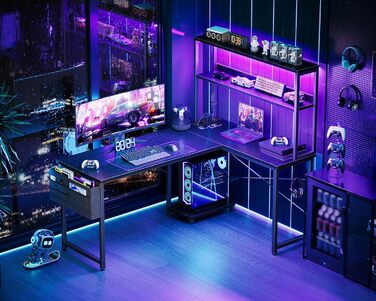 Ігровий стіл Coleshome L-подібної форми з LED-підсвічуванням та розетками, 135 × 100 см. Реверсивний кутовий стіл з полицями для зберігання, з кишенькою для аксесуарів. Чорний колір. Підходить для home office та геймінгу.