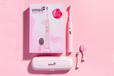 Набір із 2-х сонічних електричних зубних щіточок OMEO +365 Teeth&Face (Блакитна та Рожева)