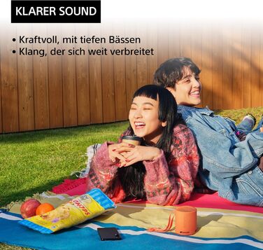 Портативна Bluetooth колонка Sony SRS-XB100 помаранчевого кольору: вологозахист IP67, до 16 год роботи, з ремінцем