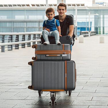 Набір валіз Joyway 5шт з ABS пластику, розширюваний, з TSA-замком, 4 колеса, сірий. Включає: валіза, сумка, кульок