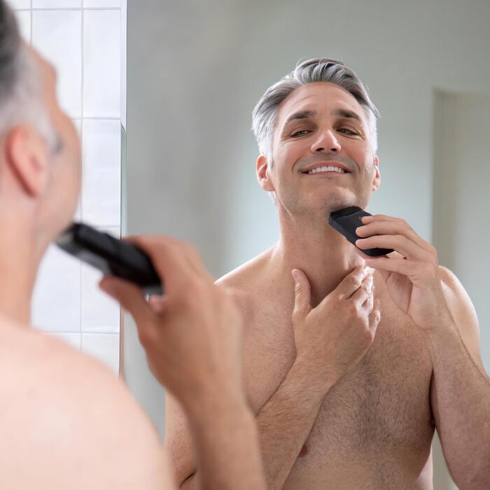 The Handyman™ by MANSCAPED®: Travel Shaver, Lightweight Rechargeable Electric Shaver with USB-C Charging Cable for On-the-Go, Washable, with Long Hair Trimmer and Foil Shaver Head.