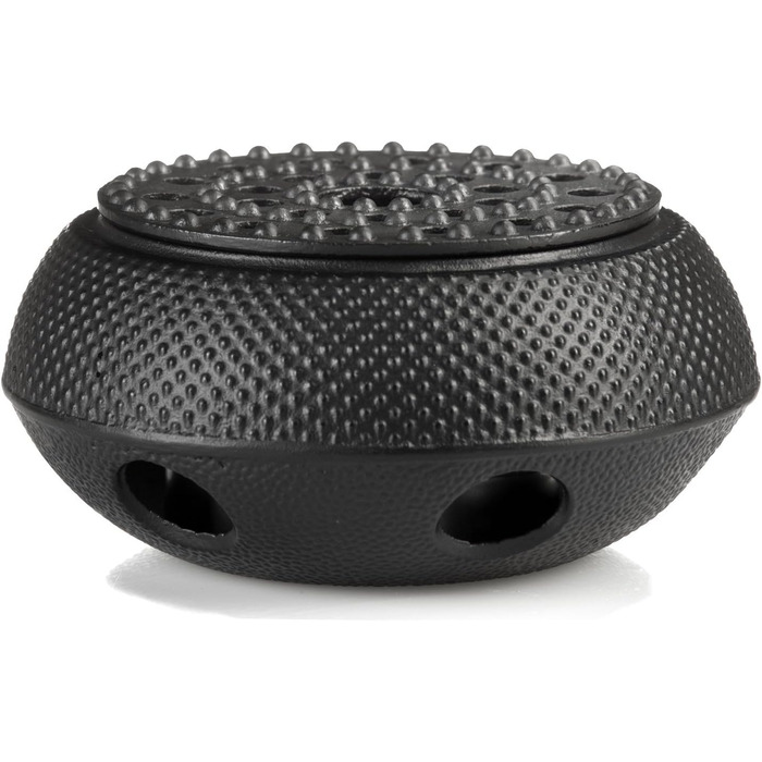 Cast iron tea warmer with textured surface
