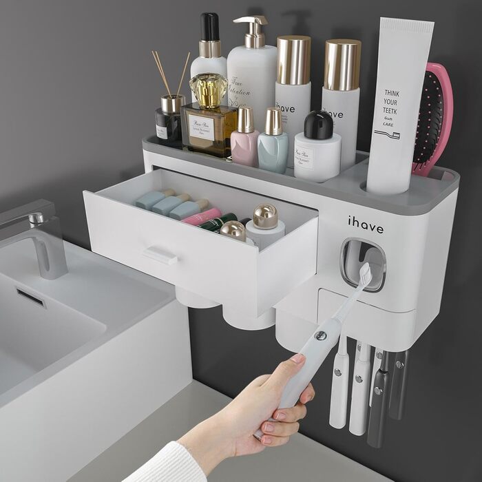 I have a bathroom toothbrush holder, 3-cup toothbrush holder with toothpaste dispenser, bathroom accessories with large storage space, cosmetic drawer, white