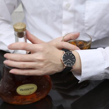 Жіночий годинник на батарейці: аналоговий, чорний корпус рожевого золота