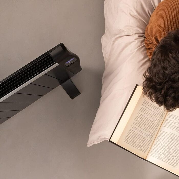 Cecotec ReadyWarm 2000 Thermal Black Flat Radiator with Remote Control. 10 heating ribs and 1500W, LCD display, programmable timer, temperature selection, 15 m² range and maximum safety with 10 elements in black.