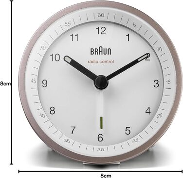Classic analog radio alarm clock by Braun for the Central European Time zone (CET/GMT+1) with snooze function, lighting, quiet movement, crescendo alarm in white and rose, model BC07PW-DCF