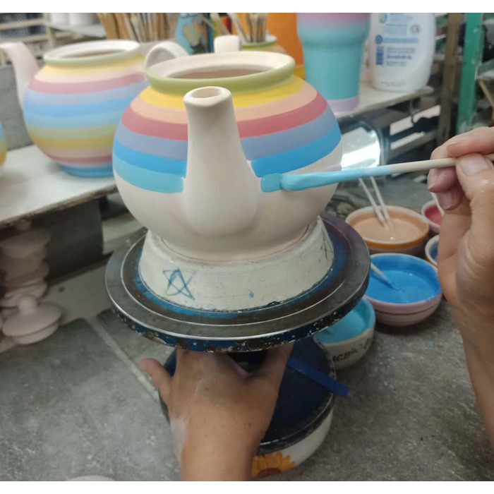 Hand-painted sugar bowl and teapot set with rainbow stripes