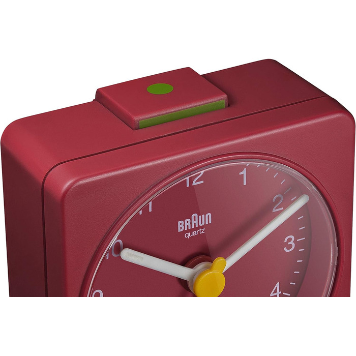 Braun Classic Analog Travel Alarm Clock, compact size, quiet quartz movement, crescendo alarm in red, model BC02R.