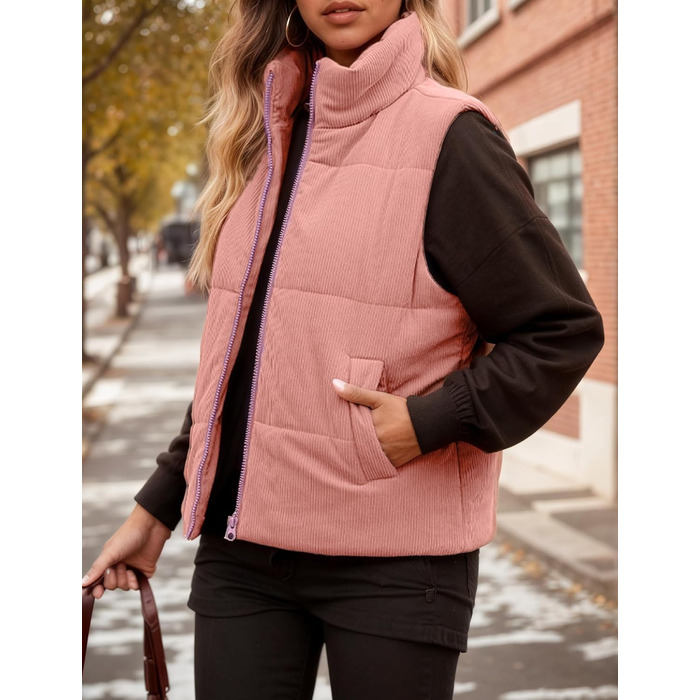 Жіноча тепла безрукавка FEOYA: коротка, з високим коміром, утеплена, рожевого кольору