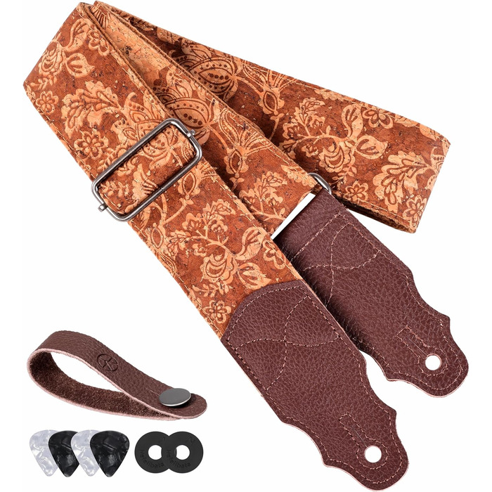 Гітарний ремінь з натуральної шкіри (2 дюйми) для акустичної, бас та електрогітари. Регулюється від 96 до 163 см. М'яка обробка деревини, коричнева квітка.
