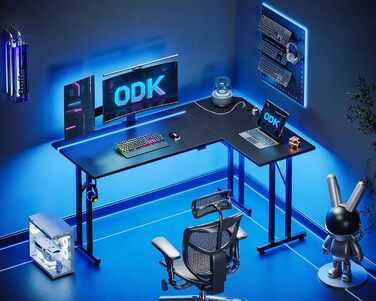 Ігровий стіл ODK L-подібний з LED та розеткою, комп'ютерний стіл з гачком для навушників, кутовий письмовий стіл для дому, карбон, чорний, 130×90 см